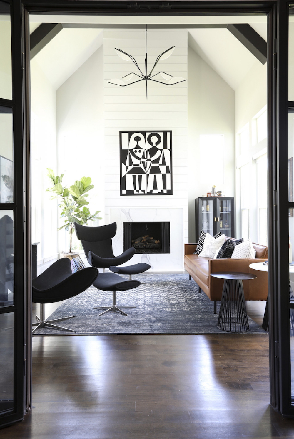 den-doorway-interior-design-fireplace-beyond-id