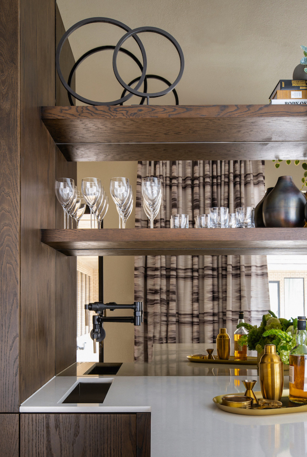 family-room-home-bar-interior-design-wooden-shelves-gold-tray