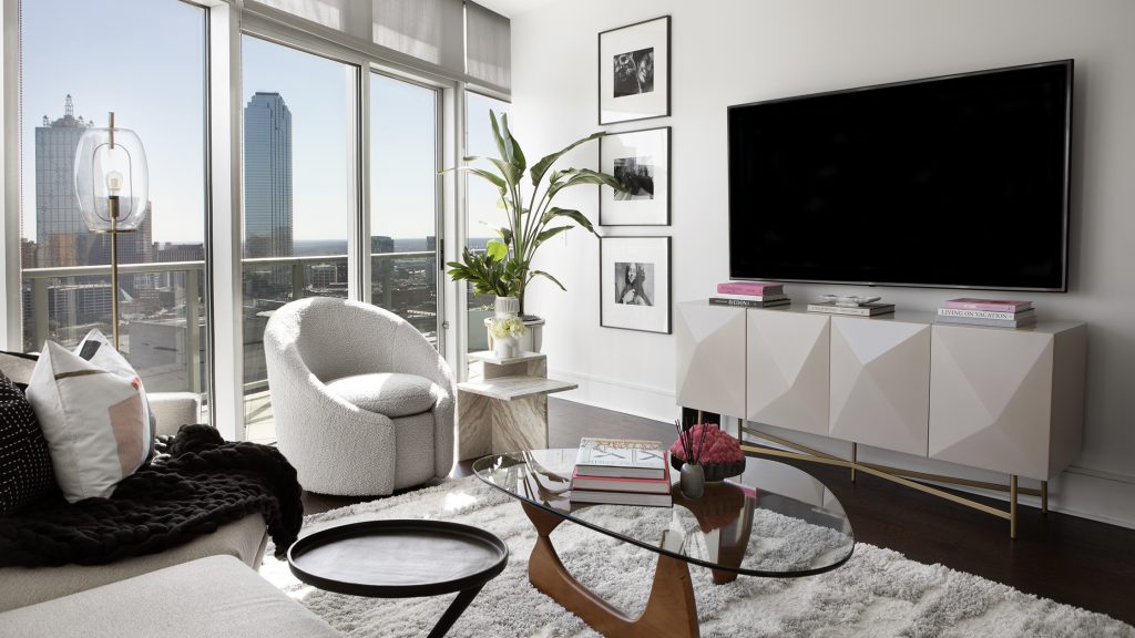 Modern designed living space with skyline view of Downtown Dallas.