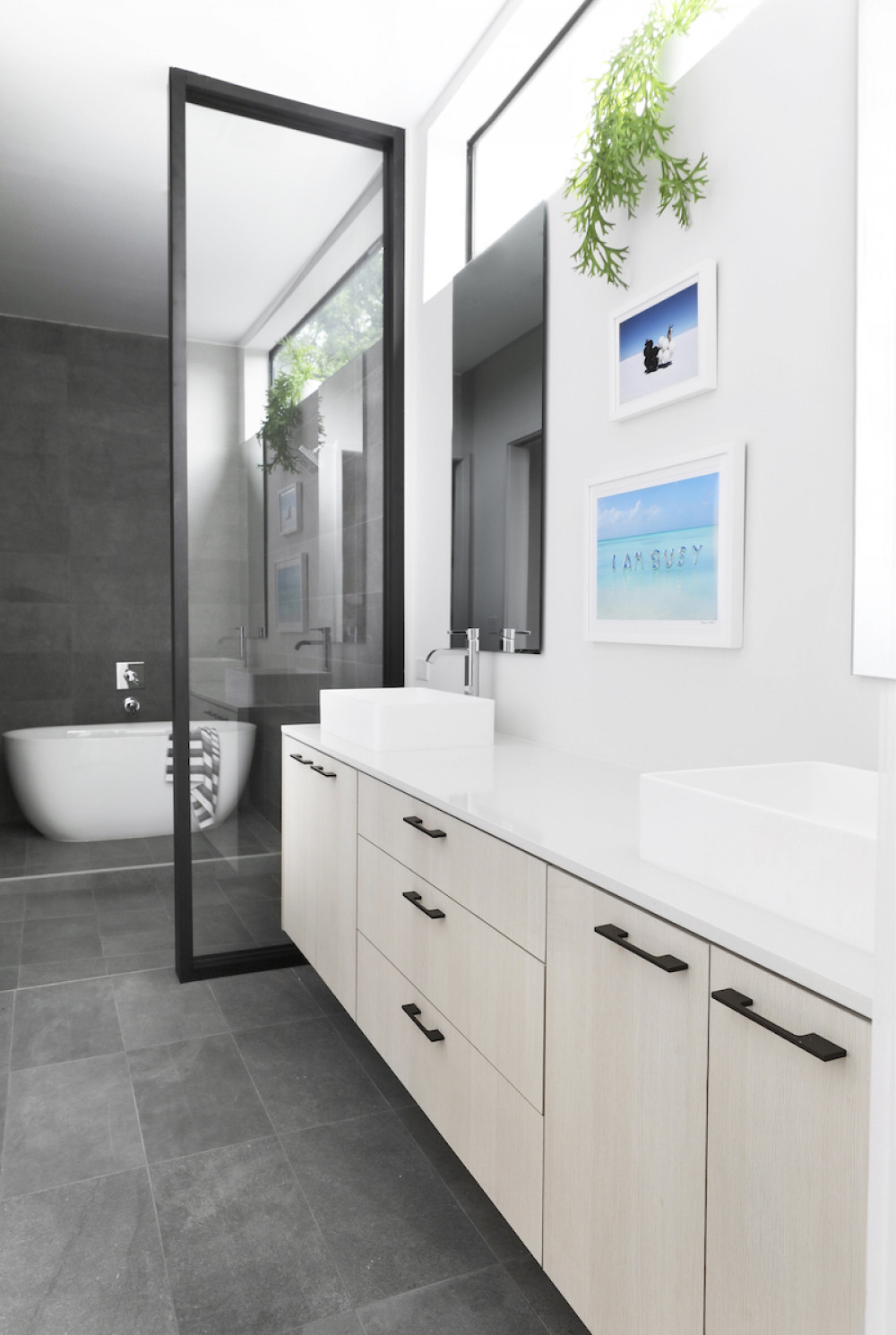 bathroom-interior-design-half-wall-glass-shower-bathtub-beyond-id