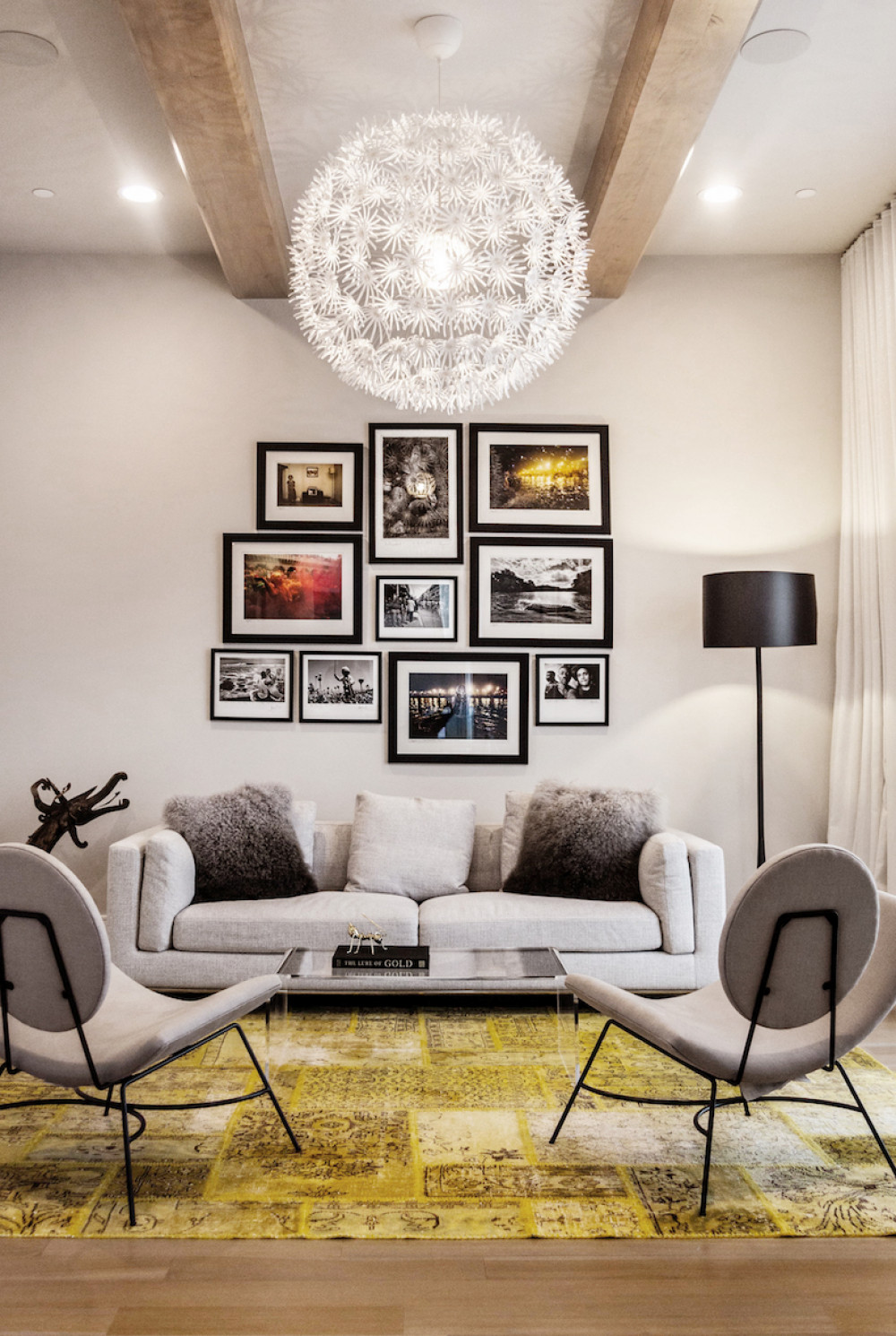 beyond-interior-design-living-room-design-gallery-wall-round-chandelier
