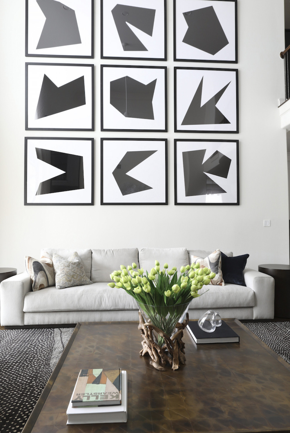 gallery-wall-black-and-white-geometric-art-living-room-interior-design