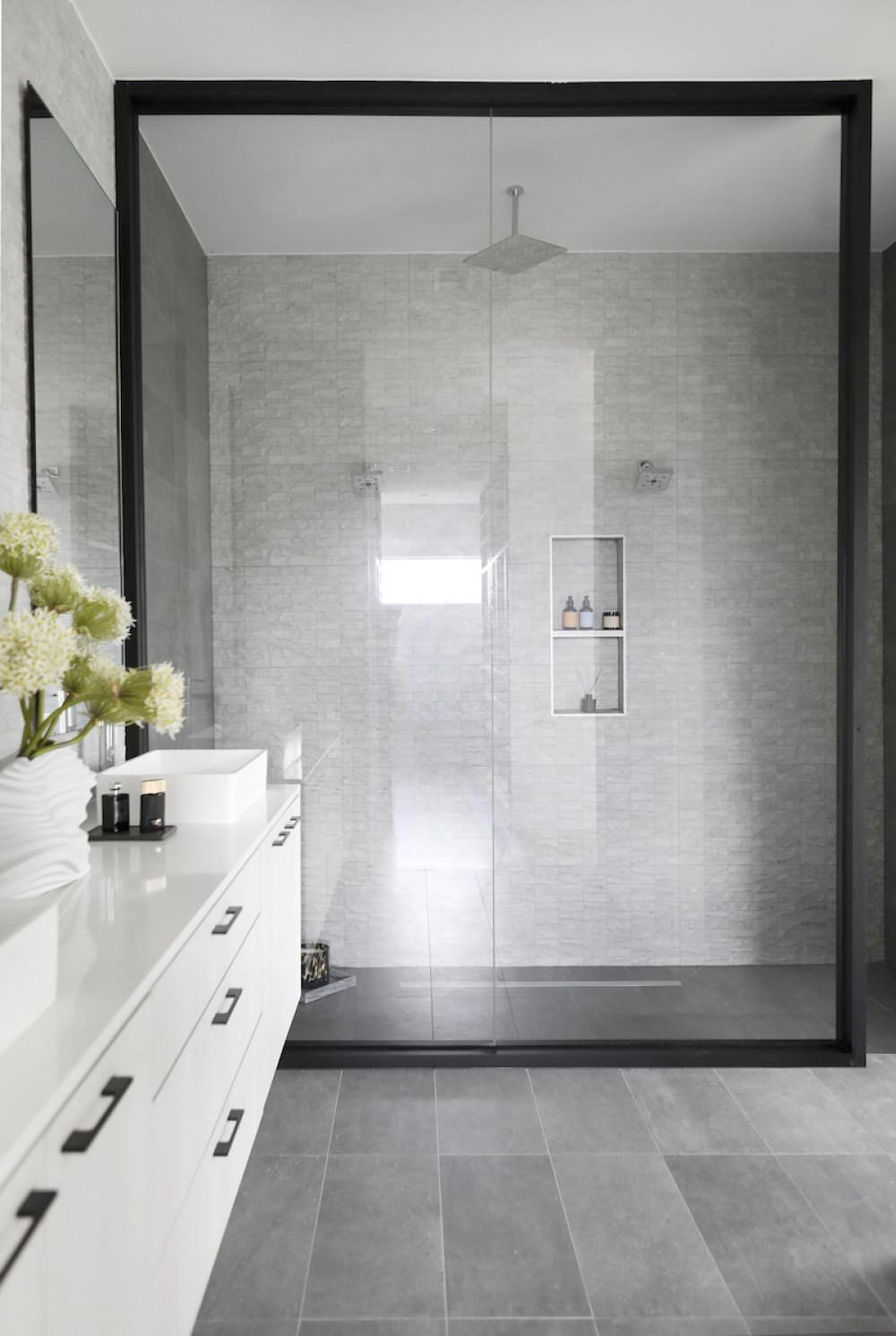 glass-shower-black-frame-gray-tile-floor-dallas-tx