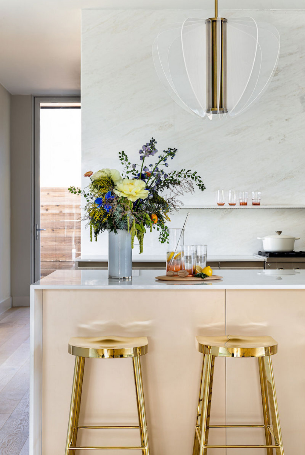 gold-barstools-kitchen-island-marble-kitchen-wall
