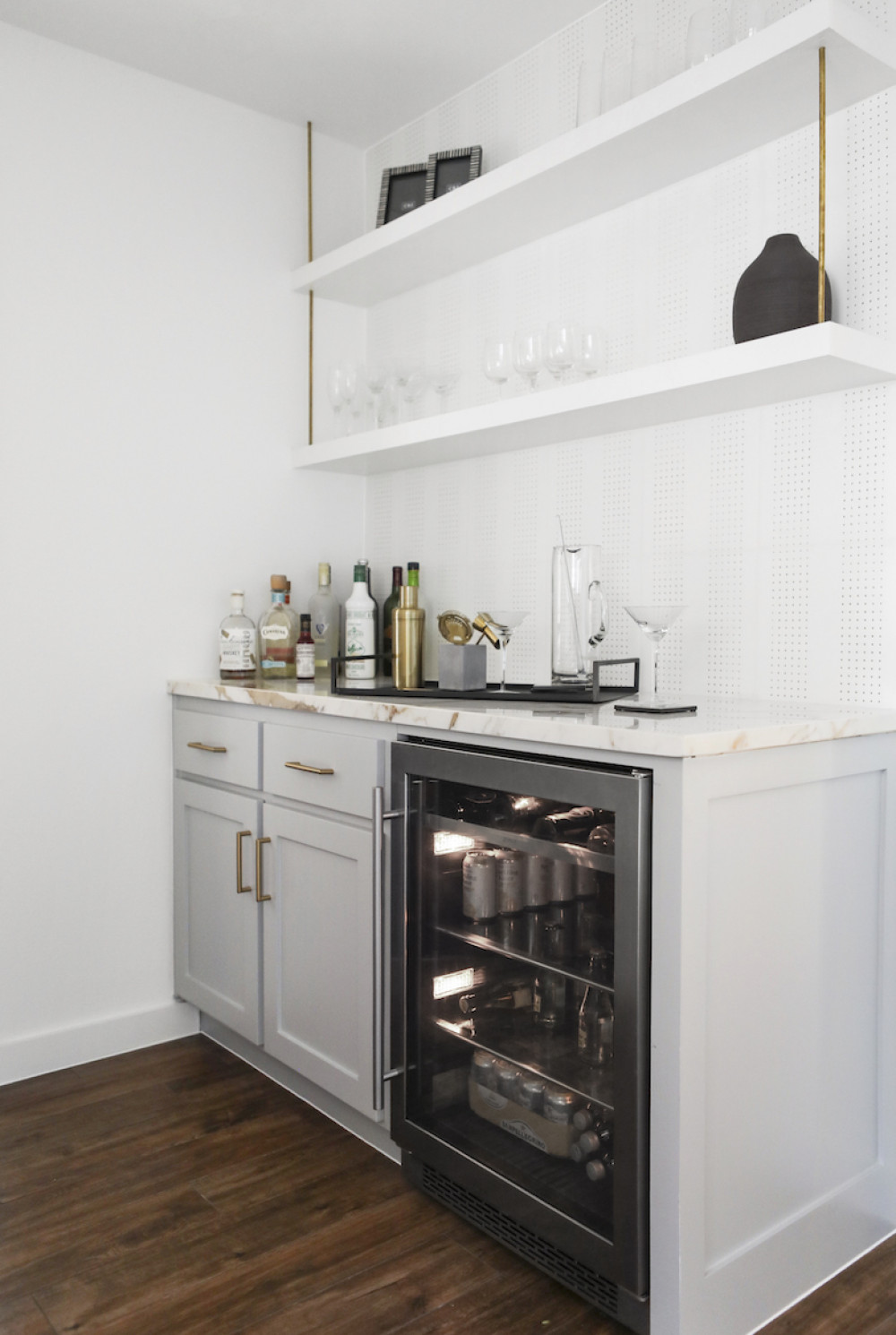home-bar-wine-drinks-fridge-glass-shelves-marble-counter-top