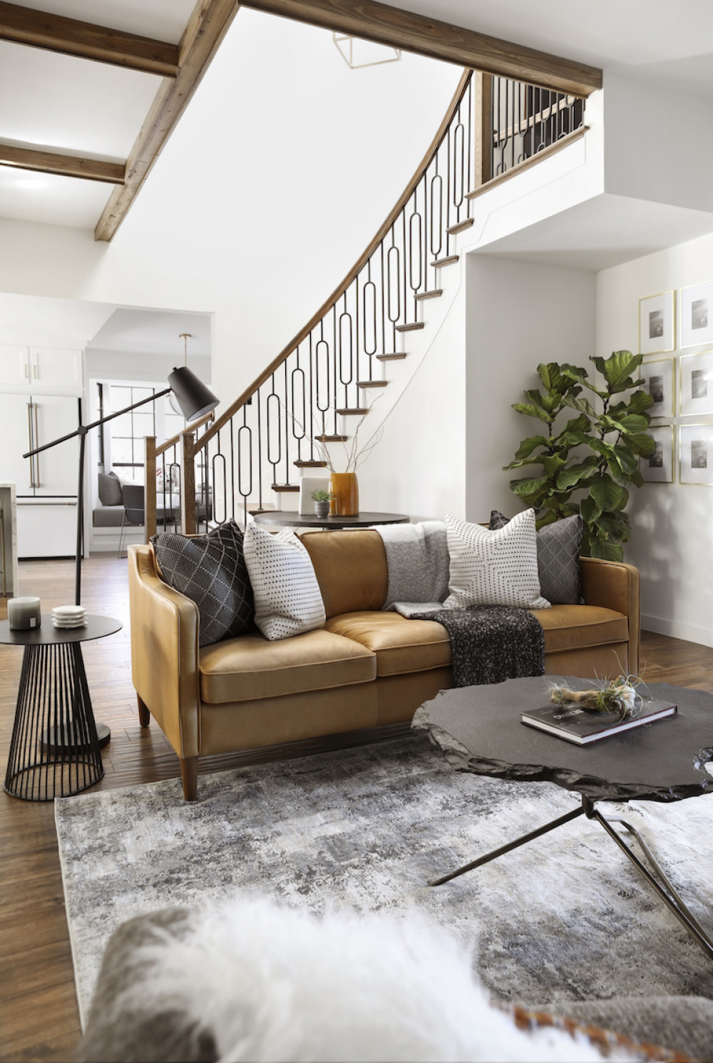 living-room-interior-design-slate-coffee-table-leather-sofa