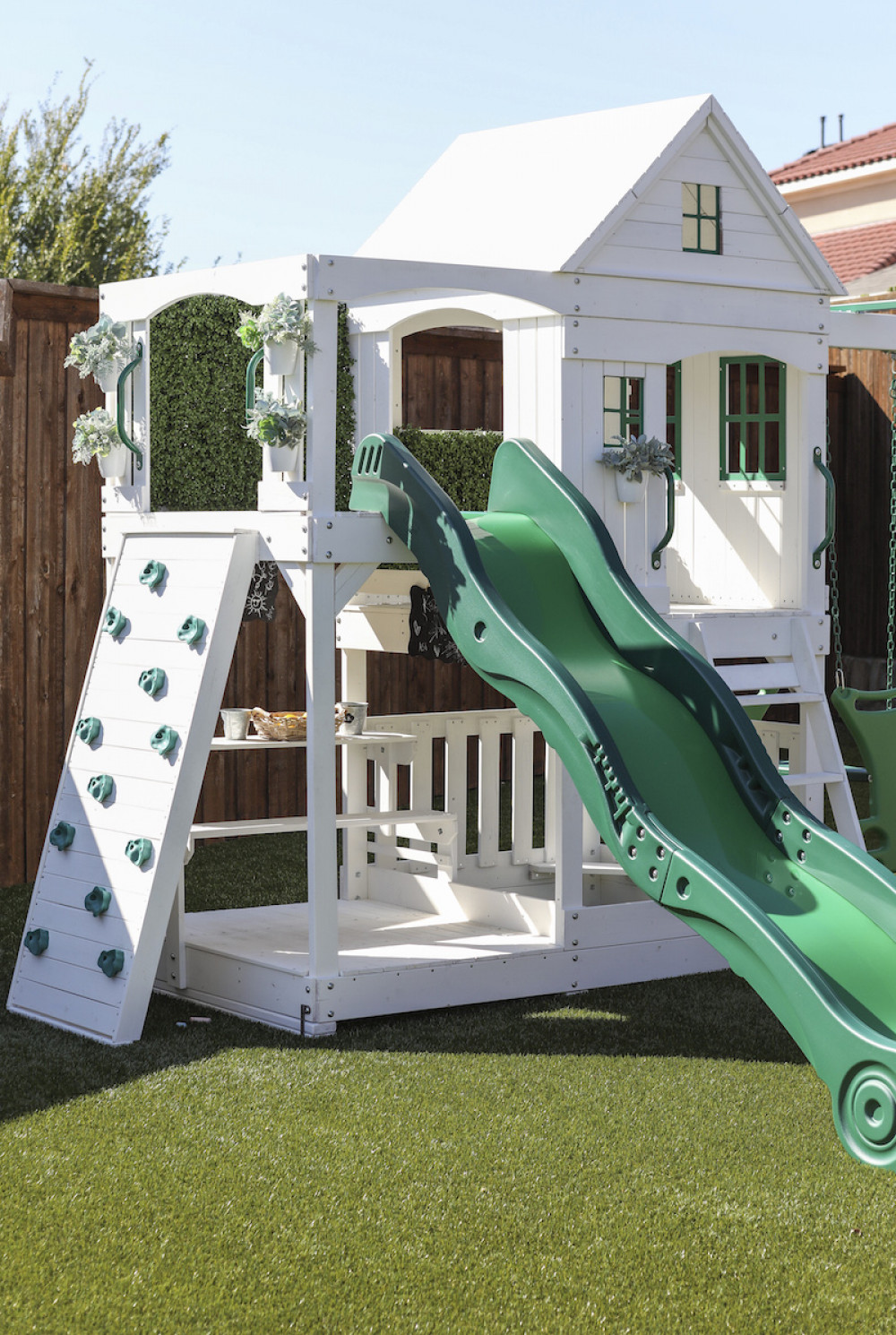 playhouse-swingset-green-white-climbing-wall