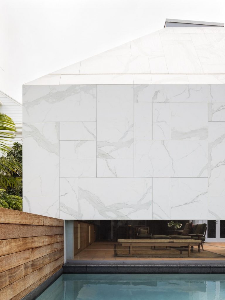 Modern monolithic exterior of home featured in Wallpaper