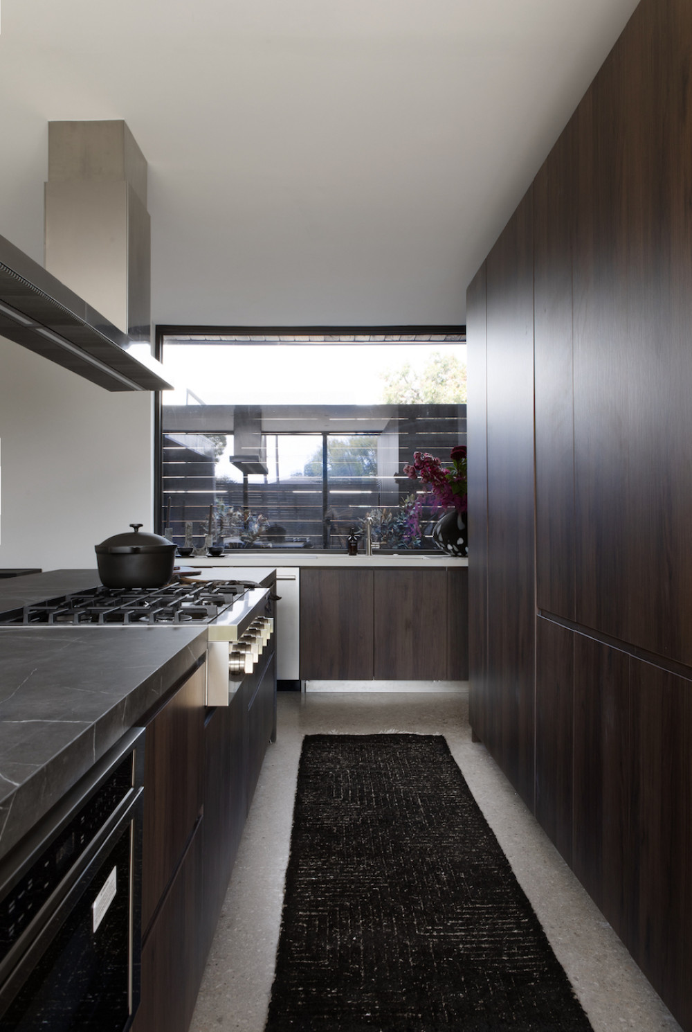 black-furniture-rug-kithchen-design-beyond-interior-design